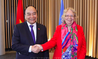 Chủ tịch nước Nguyễn Xuân Phúc gặp Tổng Giám đốc Văn phòng LHQ Tatiana Valoya. (Ảnh: TTXVN)