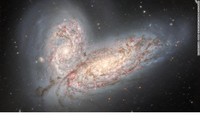 Hình ảnh mới nhất về các thiên hà xoắn vào nhau 
