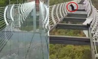 Cầu kính cao 100 mét ở Trung Quốc bất ngờ bị gió thổi bay nhiều mảnh khiến du khách sợ hãi