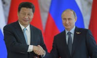 Chủ tịch Trung Quốc Tập Cận Bình (trái) và Tổng thống Nga Vladimir Putin (phải). Ảnh: Sputnik News