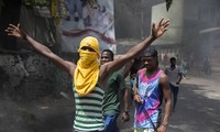 Người Haiti biểu tình lên án vụ ám sát ông Moise. Ảnh: AP