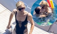 Paris Hilton gây bất ngờ với thân hình cơ bắp, ôm hôn chồng ngọt ngào trên biển