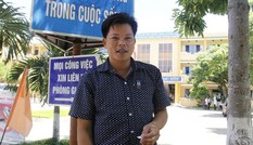 Ông bố hai con ở Đà Nẵng đi thi tốt nghiệp