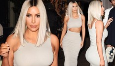Kim Kardashian diện đầm ôm cắt xẻ khoe dáng đồng hồ cát