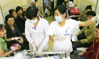 Việc cải tiến quy trình khám bệnh tại các BV đã giảm được thời gian bệnh nhân chờ đợi. Ảnh: Hồng Vĩnh