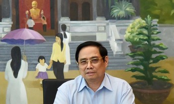 Thủ tướng Phạm Minh Chính tại phiên thảo luận tổ chiều 24/7. Ảnh Như Ý