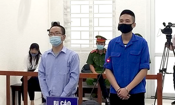 Cựu Giám đốc và đồng phạm tại toà. Ảnh: Đ.C
