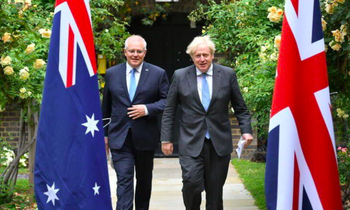 Thủ tướng Anh Boris Johnson và người đồng cấp Úc Scott Morrison trong cuộc gặp hồi tháng 6/2021. (Ảnh: Reuters)