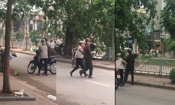 Trật tự phường ném cân của người bán hàng rong xuống sông. Ảnh: Cắt từ clip