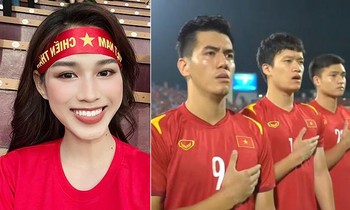 Hoa hậu Đỗ Thị Hà mặc áo cờ đỏ sao vàng, rạng rỡ trên sân Việt Trì cổ vũ tuyển Việt Nam