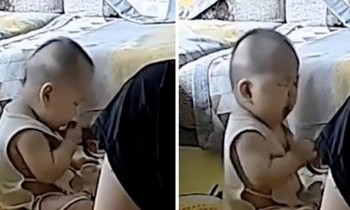 Trung Quốc: Mải xem điện thoại, ông bố để con 9 tháng tuổi làm điều khiến ai cũng giận dữ