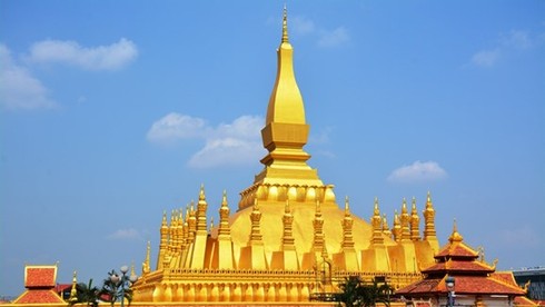 Công trình biểu tượng văn hóa Phật giáo nào được coi là biểu tượng nước Lào, xuất hiện trên quốc huy và tiền của nước này?