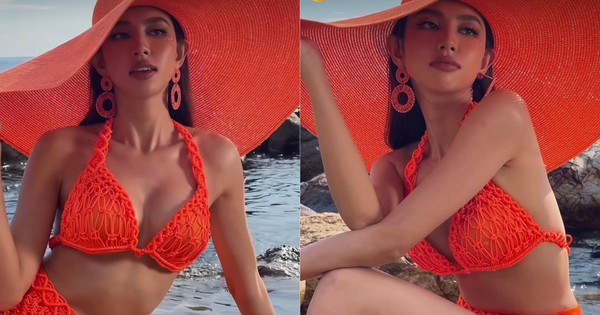Hoa hậu Thuỳ Tiên mặc bikini đỏ rực, khoe dáng nóng bỏng tựa 'nàng tiên cá' trên biển