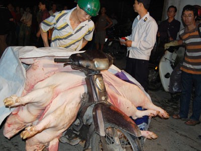 Mười con lợn bán ngoài chợ, sáu con mất vệ sinh
