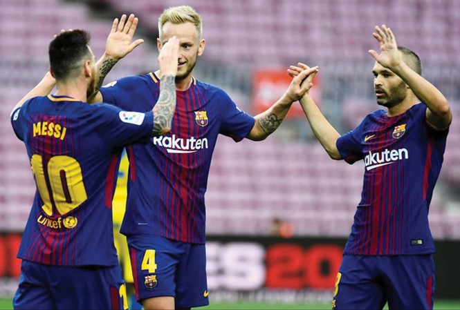 Barca và tương lai bất định tại La Liga Cầu thủ Barca ăn mừng bàn thắng trong cảnh khán đài Nou Camp không một bóng khán giả.\Ảnh: GETTYIMAGES.