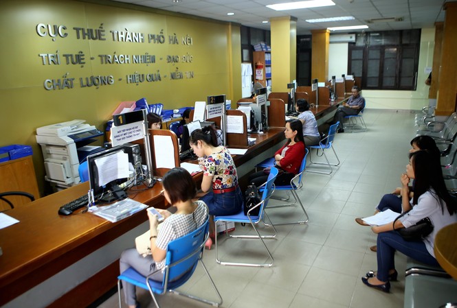 Xử lý doanh nghiệp nợ thuế: Nguy cơ mất trắng hơn 30 nghìn tỷ đồng Doanh nghiệp nợ thuế, nguy cơ nhà nước mất trắng lên con số hàng chục nghìn tỷ đồng. (Trong ảnh: Người dân và doanh nghiệp đóng thuế tại Cục Thuế TP Hà Nội) Ảnh: Ngọc Châu