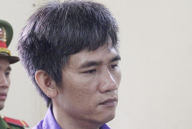 Người đàn bà bị bạn tình sát hại, phi tang xác dã man Hoàng Trọng Đông tại tòa sáng 17/9. Ảnh: Tân Châu