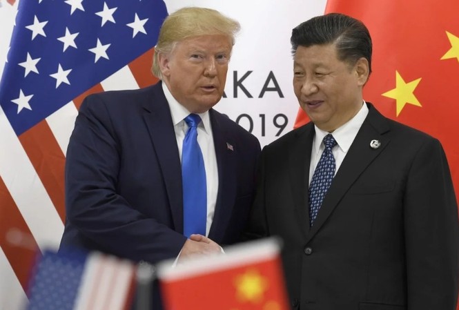 Ông Trump xác nhận sẽ cùng ông Tập ký thỏa thuận thương mại Tổng thống Mỹ Donald Trump và Chủ tịch Trung Quốc Tập Cận Bình gặp nhau bên lề Thượng đỉnh G20 hồi tháng 6 tại Nhật Bản. (Ảnh: AP)