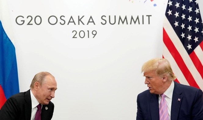 Ông Putin cảm ơn ông Trump giúp ngăn chặn tấn công khủng bố Lãnh đạo Nga và Mỹ gặp nhau tại thượng đỉnh G20 ở Osaka, Nhật Bản, vào tháng 6 năm nay. (Ảnh: Reuters)