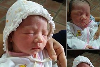 Phát hiện bé gái sơ sinh trước cổng chùa Hình ảnh bé gái được đăng tải trên mạng xã hội.