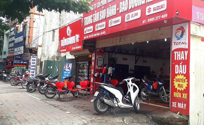 Diễn biến mới nhất vụ nổ súng tại hiệu sửa xe máy ở Hà Nội Cửa hàng sửa chưa xe máy nơi xảy ra sự việc