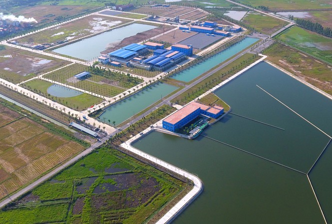 HĐND Hà Nội không đồng ý dùng ngân sách bù giá nước sông Đuống Hồ lắng nhà máy nước Sông Đuống - Ảnh: Hoàng Mạnh Thắng