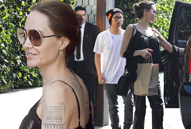 Angelina Jolie mặc áo 2 dây trẻ trung, khoe loạt hình xăm ở lưng Angelina Jolie mặc áo 2 dây trẻ trung, khoe loạt hình xăm ở lưng
