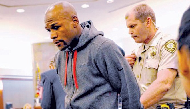 Trận đấu 300 triệu USD: Cuộc chiến giữa “thiện và ác” Floyd Mayweather bị bắt trong vụ hành hung bạn gái cũ Josie Harris. Ảnh: Getty Images