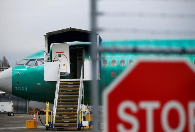 Boeing dừng sản xuất 737 MAX Một chiếc Boeing 737 MAX đậu trong khu sản xuất của Boeing ở Renton, Washington, ngày 16/12 Ảnh: Reuters