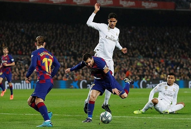 Real chia điểm với Barca Messi bỏ lỡ cơ hội trong hiệp hai. Ảnh: Reuters.