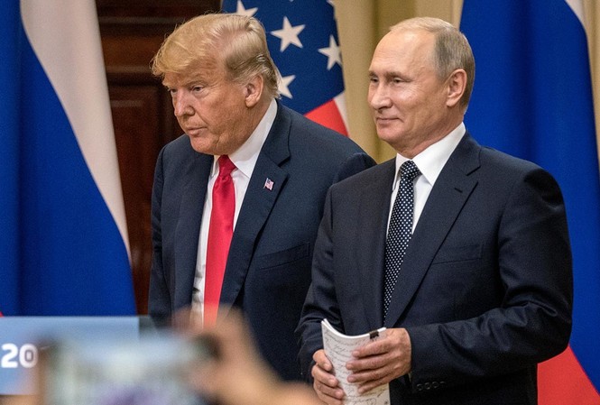 Ông Putin tin ông Trump sẽ không mất chức dù bị luận tội Tổng thống Nga Vladimir Putin và Tổng thống Mỹ Donald Trump. Ảnh: Getty