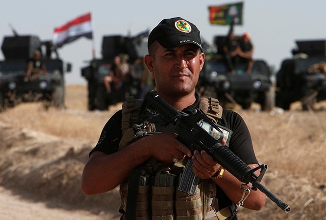 Iraq tấn công tổng lực giải phóng Mosul khỏi tay IS Một binh sỹ của quân đội Iraq sẵn sàng đợi lệnh tấn công Mosul