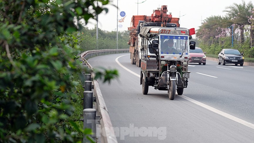 Lạnh gáy cảnh 'đua' xe đạp, lái ba gác trên đại lộ Võ Nguyên Giáp - ảnh 7
