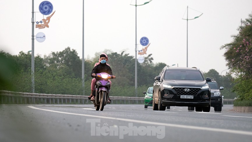 Lạnh gáy cảnh 'đua' xe đạp, lái ba gác trên đại lộ Võ Nguyên Giáp - ảnh 10