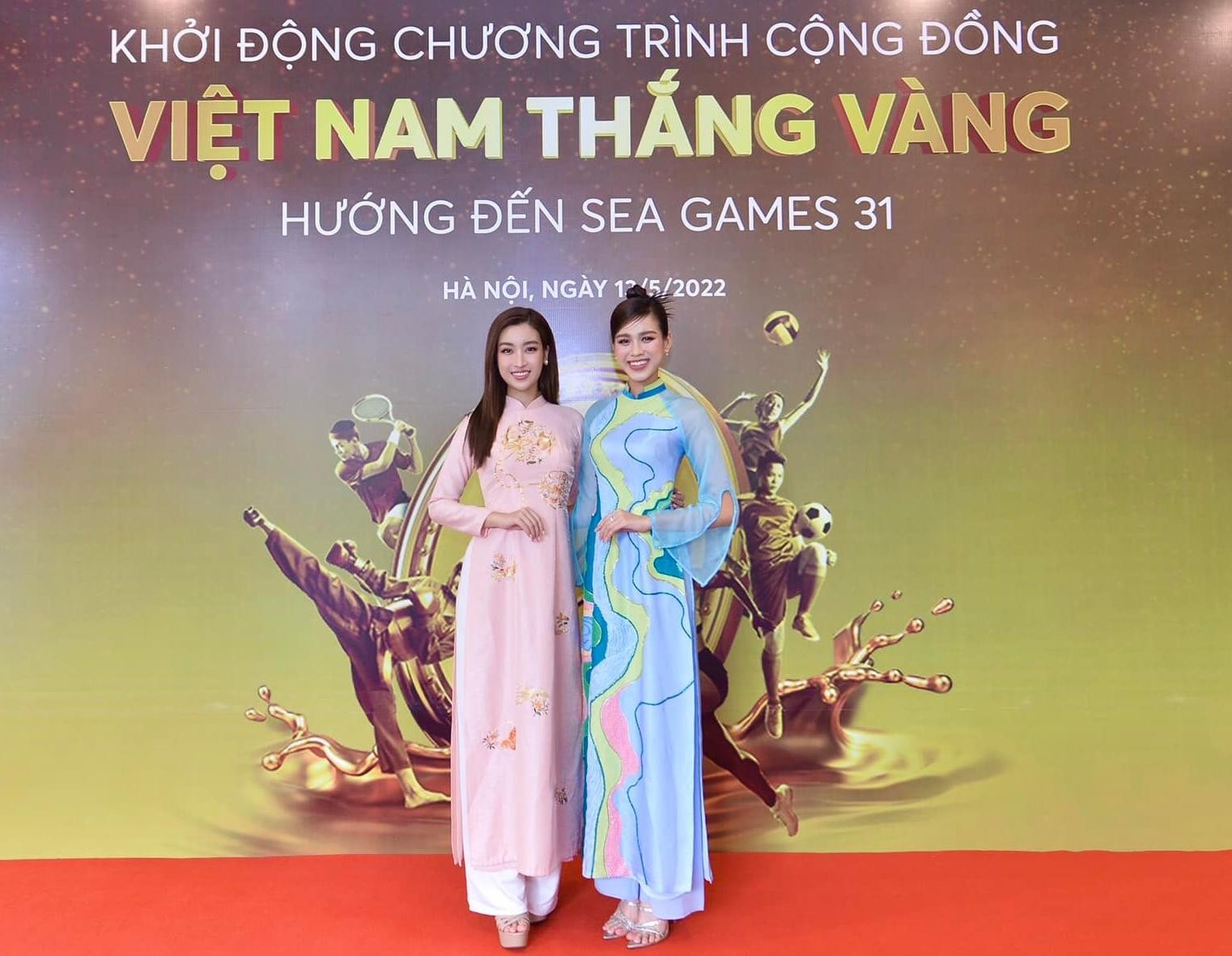 Hoa hậu Đỗ Thị Hà, Đỗ Mỹ Linh khoe sắc rạng rỡ với áo dài cổ vũ SEA Games 31 ảnh 1