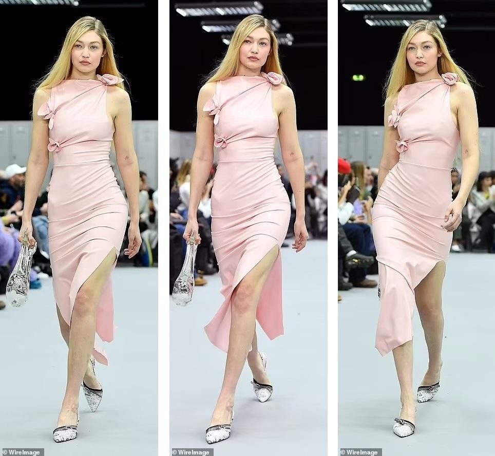 Bella Hadid mặc váy xuyên thấu lộ ngực trần, đọ dáng với chị gái Gigi trên sàn catwalk ảnh 6