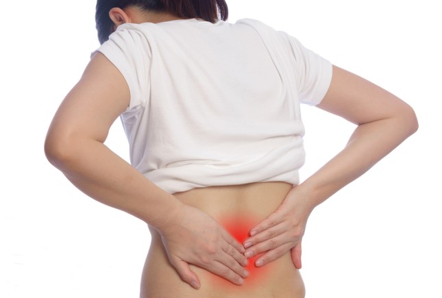 Đối phó với chứng đau lưng trong tiết trời giao mùa ảnh 1