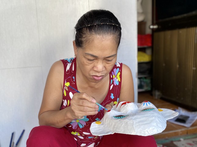 Cặp vợ chồng giữa lòng Thủ đô ngót nghét nửa thập kỷ thổi hồn vào mặt nạ giấy ảnh 1