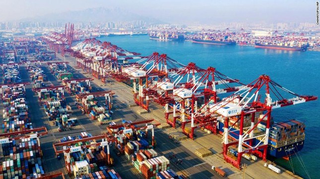 Mỹ, Trung ký thỏa thuận thương mại, thế giới vẫn lo ảnh 1