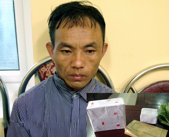 Dùng súng, lựu đạn phòng thân khi mang heroin qua biên giới ảnh 1