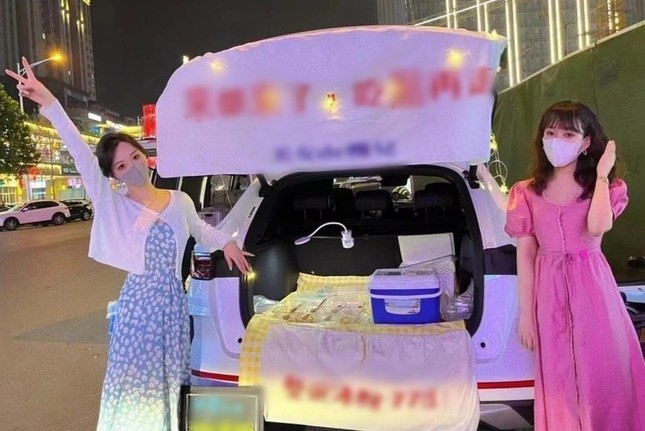 Người trẻ Trung Quốc bỏ văn phòng đi bán hàng rong ảnh 1