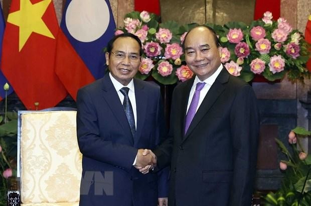 Chủ tịch nước: Tăng cường kết nối hai nền kinh tế Việt Nam-Lào ảnh 1