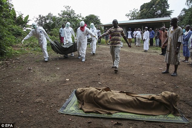 Những hình ảnh đau lòng về dịch bệnh khủng khiếp Ebola ảnh 13