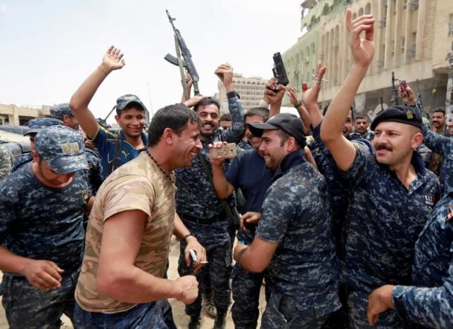 Lực lượng Iraq ăn mừng chiến thắng sớm tại thành cổ Mosul ảnh 4