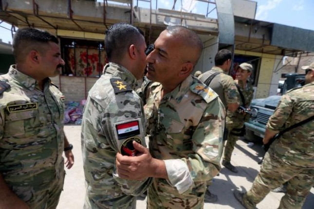 Lực lượng Iraq ăn mừng chiến thắng sớm tại thành cổ Mosul ảnh 6