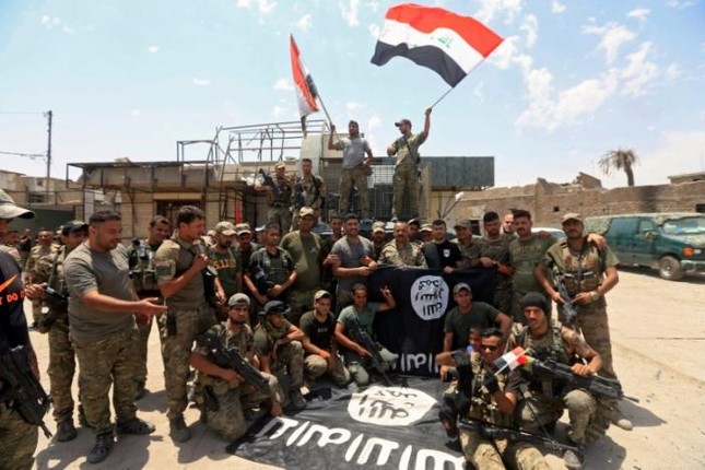 Lực lượng Iraq ăn mừng chiến thắng sớm tại thành cổ Mosul ảnh 8