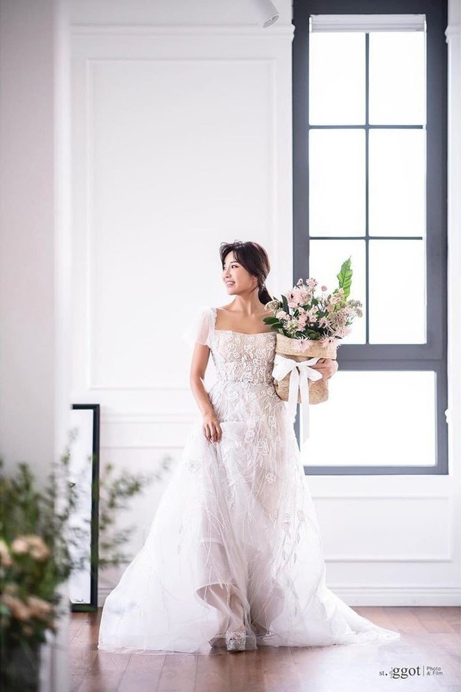 Vợ chồng Bi Rain - Kim Tae Hee sánh đôi tại đám cưới em trai - ảnh 8