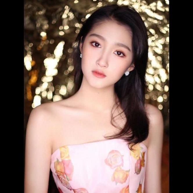 Quan Hiểu Đồng 1 bước lên