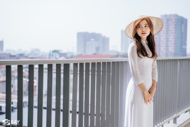 Nữ sinh trường Đại học Xây dựng đẹp thuần khiết với tà áo dài trắng - ảnh 12