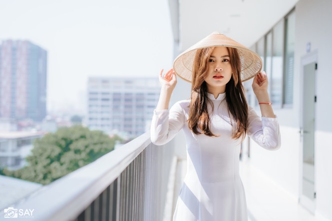 Nữ sinh trường Đại học Xây dựng đẹp thuần khiết với tà áo dài trắng - ảnh 14